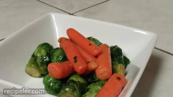Baby Carrots And Brussels Sprouts Glazed With Brown Sugar and Pepper