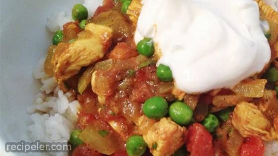 East ndian Chicken with Tomato, Peas, and Cilantro