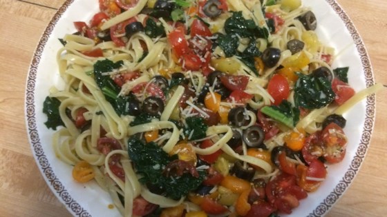 Fettuccine With Kale And Tomato-olive-cream Sauce