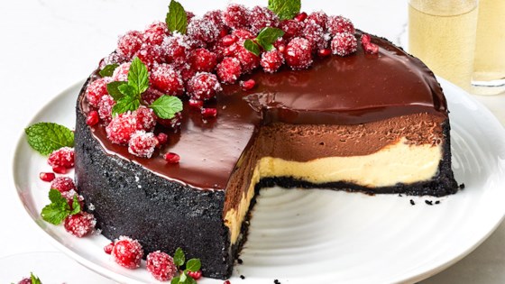 ghirardelli layered chocolate cheesecake with ganache glaze
