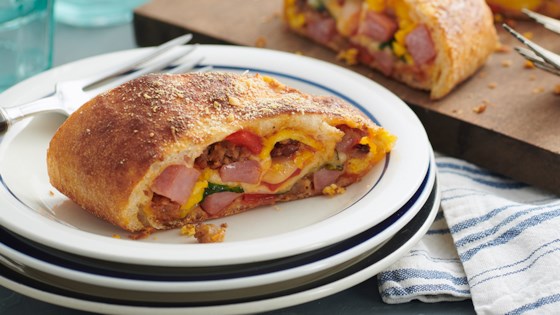 Ham And Sausage Breakfast Stromboli With Roasted Peppers And Spinach