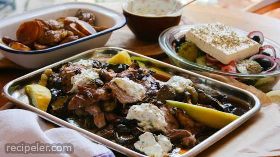 Roast Greek Lamb With Tzatziki, Roasted Vegetables, And Greek Salad