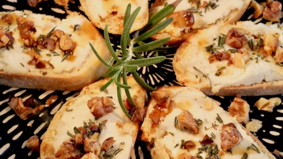 rosemary and goat cheese crostini with walnuts and honey