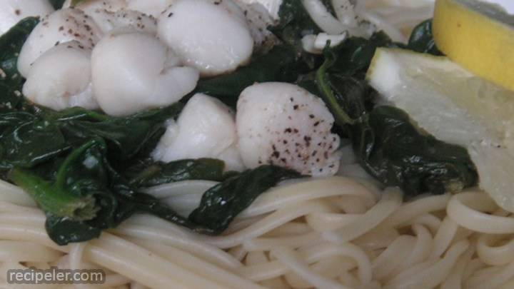 scallops and spinach over pasta