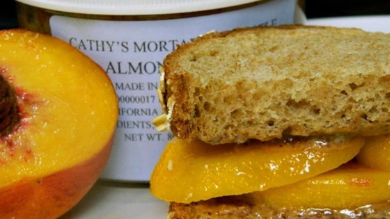 summertime almond butter and peach sandwich