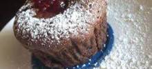 molten chocolate cakes with sugar-coated raspberries