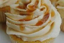 almond cupcake with salted caramel buttercream frosting