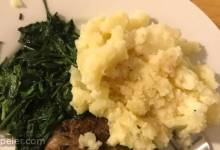 Cumin Lamb Steaks with Smashed Potatoes, Wilted Spinach and Red Wine Sauce