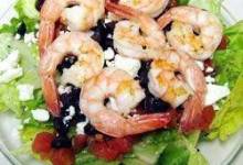 Greek-Style Shrimp Salad on a Bed of Baby Spinach