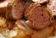 grilled sausages with caramelized onions and apples