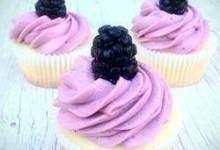lemon cupcake with blackberry buttercream